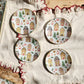 Conjunto 4 platos de pan 16 cm Casitas de navidad